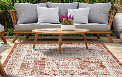 Using Outdoor Rugs to Add Visual Balance to Large Patios
