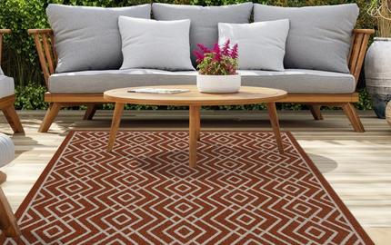 Best Styling Angle: How to Style a Terra Cream Diamond Outdoor Rug with Rattan & Wooden Furniture